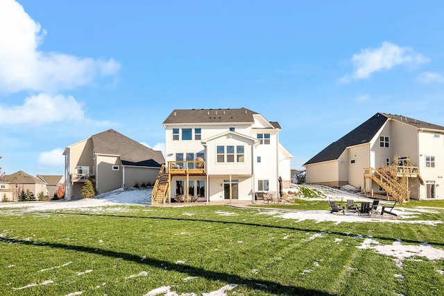 back of house featuring stairs, a lawn, and a patio