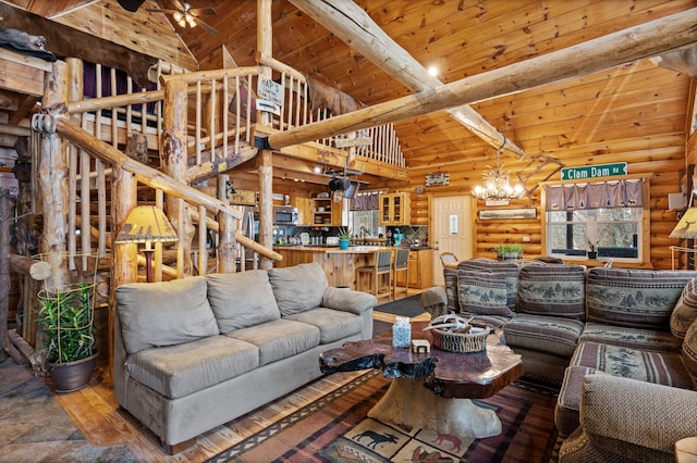 living room with high vaulted ceiling, wooden ceiling, stairway, log walls, and beamed ceiling