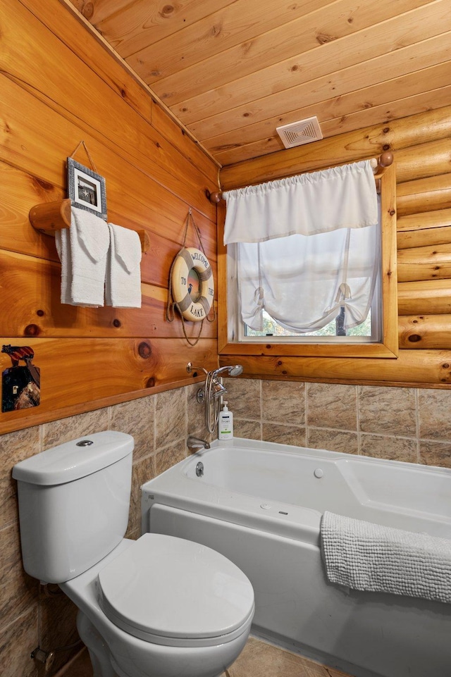 bathroom with a garden tub, log walls, visible vents, toilet, and wooden ceiling