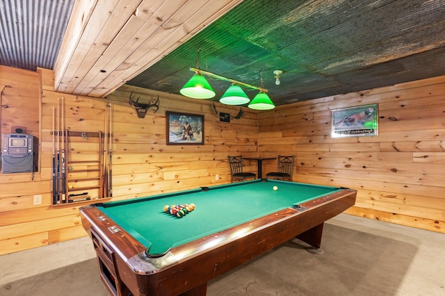 recreation room featuring wood ceiling, billiards, wooden walls, and concrete floors