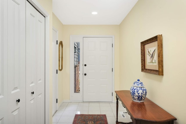 entryway featuring light tile patterned flooring