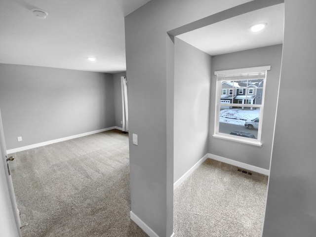 interior space with visible vents and baseboards