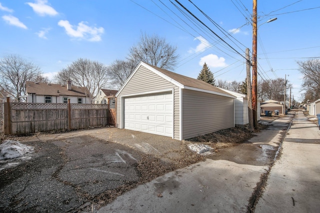 detached garage with fence