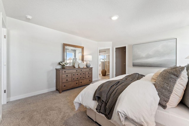 6265 Jensen Ave S, Cottage Grove, MN 55016 - bedroom featuring carpet, ensuite bath, baseboards, and a textured ceiling