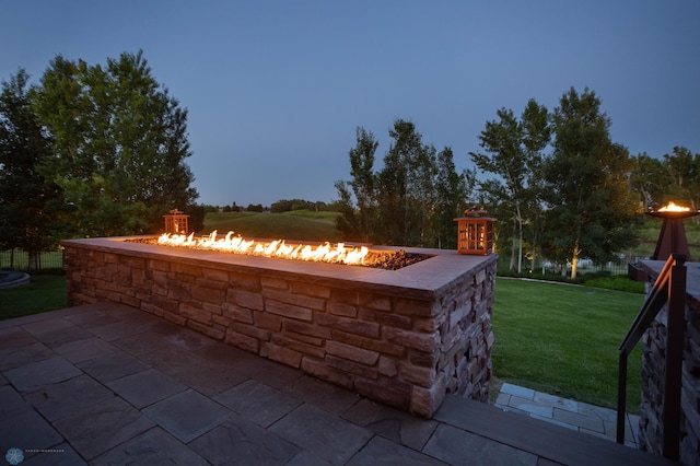 view of patio with an outdoor fire pit