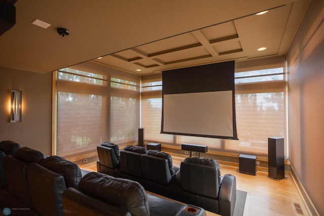 home theater with visible vents, baseboards, coffered ceiling, wood finished floors, and recessed lighting