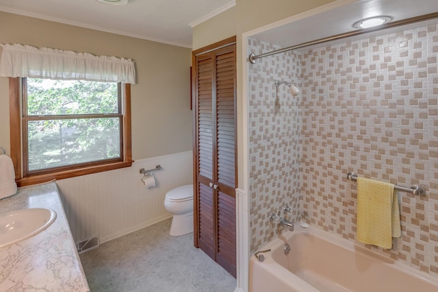 bathroom featuring toilet, a wainscoted wall, visible vents, a closet, and crown molding