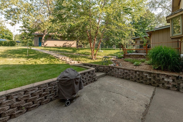 view of patio / terrace featuring grilling area and a wooden deck