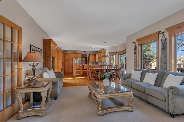 617 17th St N, Sartell, MN 56377 - living area with light wood-style floors, a chandelier, and recessed lighting
