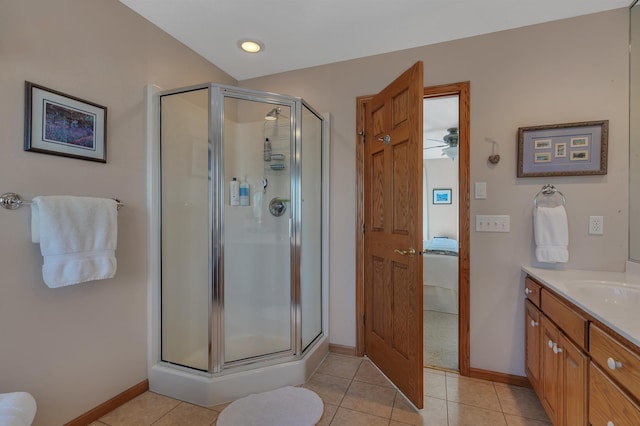617 17th St N, Sartell, MN 56377 - bathroom featuring a shower stall, vanity, baseboards, and tile patterned floors