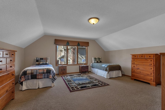 617 17th St N, Sartell, MN 56377 - carpeted bedroom featuring vaulted ceiling and a textured ceiling