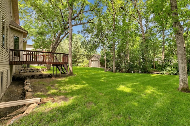 617 17th St N, Sartell, MN 56377 - view of grassy yard with stairs and a deck