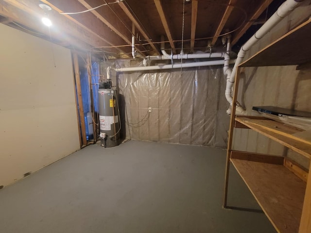 unfinished basement featuring water heater