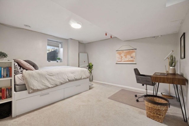 bedroom with carpet flooring and baseboards