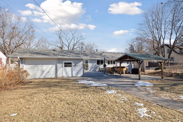 ranch-style home featuring a garage and fence