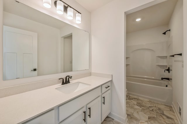 bathroom featuring visible vents, toilet, marble finish floor, vanity, and shower / washtub combination