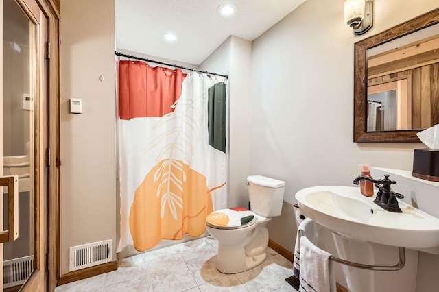 bathroom with recessed lighting, visible vents, toilet, a shower with curtain, and tile patterned floors