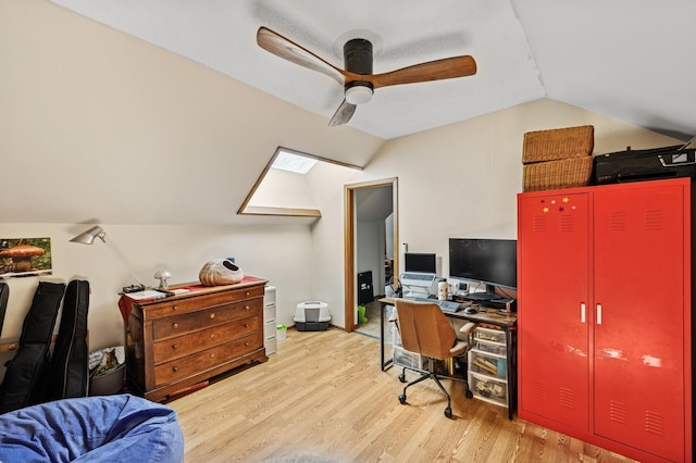 office area with a ceiling fan, vaulted ceiling, and wood finished floors