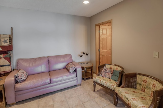 living room featuring light tile patterned floors and recessed lighting