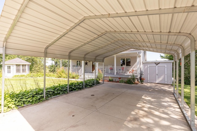 view of parking featuring a storage unit and a detached carport