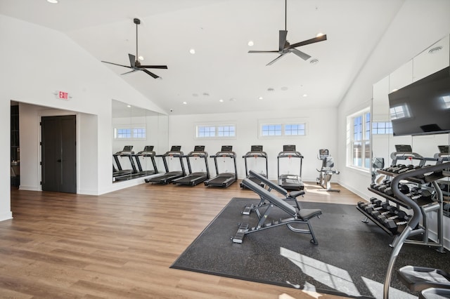 workout area featuring ceiling fan, high vaulted ceiling, recessed lighting, wood finished floors, and baseboards