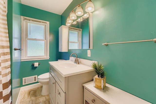11570 Juniper St NW, Coon Rapids, MN 55448 - full bath featuring toilet and vanity