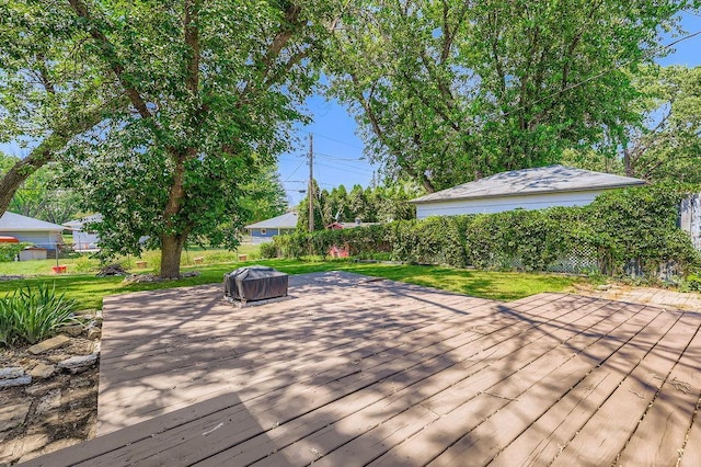 11570 Juniper St NW, Coon Rapids, MN 55448 - wooden deck featuring a fenced backyard
