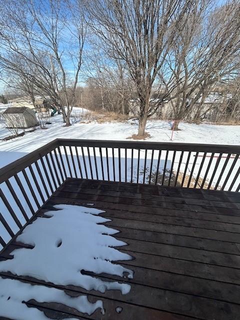 view of snow covered deck