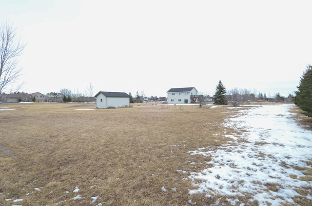 view of yard covered in snow