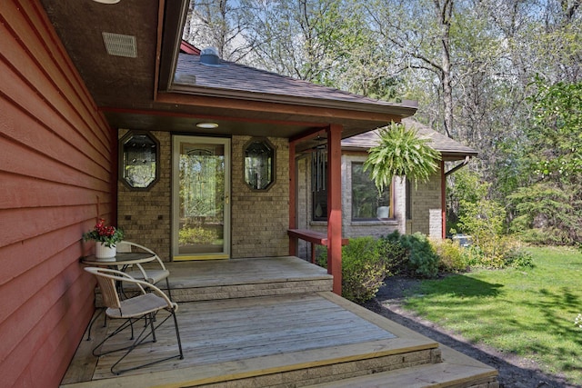 3415 197th Ave NW, Oak Grove, MN 55303 - doorway to property with a lawn, brick siding, and a shingled roof