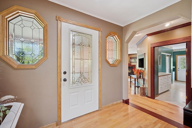 3415 197th Ave NW, Oak Grove, MN 55303 - entryway with ornamental molding, light wood-style flooring, and baseboards