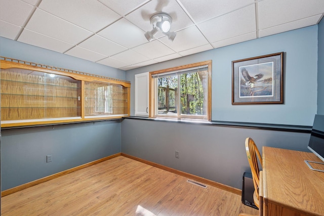3415 197th Ave NW, Oak Grove, MN 55303 - unfurnished office featuring a paneled ceiling, wood finished floors, and baseboards