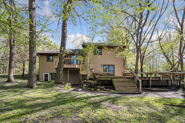 3415 197th Ave NW, Oak Grove, MN 55303 - back of property featuring a deck, a yard, and stairway