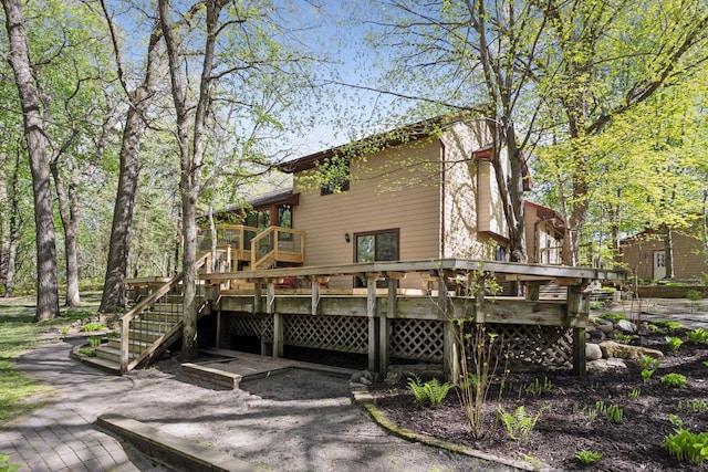 3415 197th Ave NW, Oak Grove, MN 55303 - rear view of property featuring a wooden deck and stairway