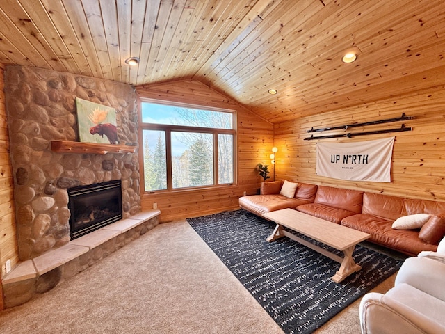 living area featuring lofted ceiling, wood walls, carpet, and wood ceiling