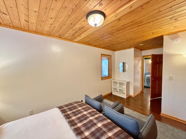 bedroom with wooden ceiling, crown molding, baseboards, and wood finished floors