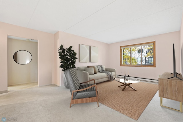 living area featuring a baseboard radiator and light colored carpet