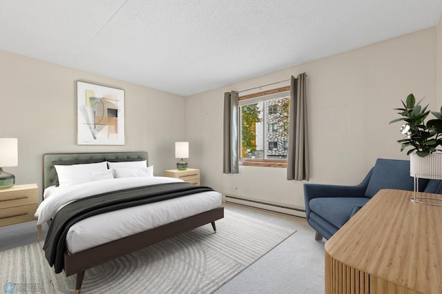 bedroom featuring a baseboard radiator, a textured ceiling, and light colored carpet