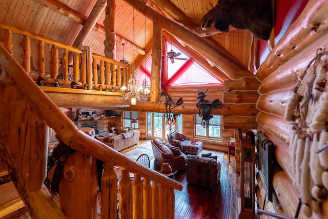 living room with high vaulted ceiling, wooden ceiling, wood finished floors, and beam ceiling