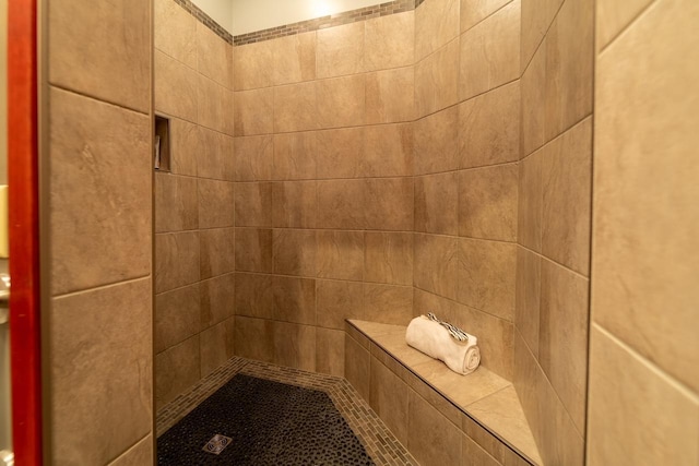 interior space with a tile shower