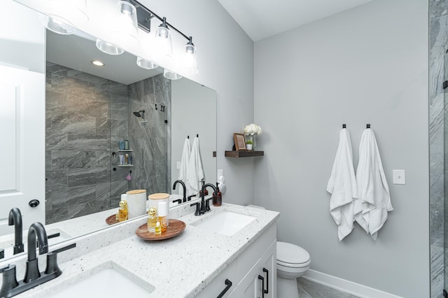 1676 Brandt Dr NE, Byron, MN 55920 - full bathroom featuring a sink, baseboards, toilet, and a tile shower