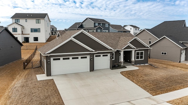 1676 Brandt Dr NE, Byron, MN 55920 - craftsman-style home featuring fence, a residential view, concrete driveway, an attached garage, and a shingled roof