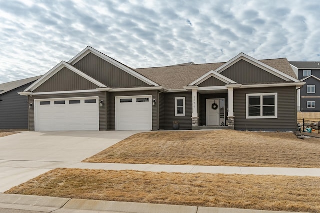 1676 Brandt Dr NE, Byron, MN 55920 - craftsman-style home with a garage, roof with shingles, and driveway