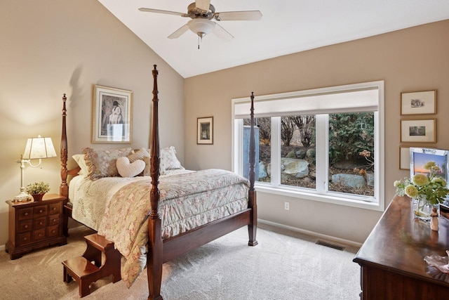 bedroom with vaulted ceiling, baseboards, a ceiling fan, and light colored carpet