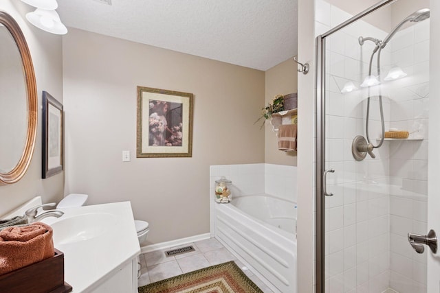 full bathroom with a garden tub, tile patterned flooring, vanity, visible vents, and a stall shower