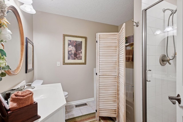 full bath featuring visible vents, a stall shower, a textured ceiling, vanity, and tile patterned floors