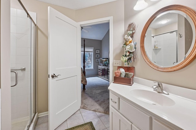 full bathroom featuring a stall shower, ensuite bath, vanity, and tile patterned floors