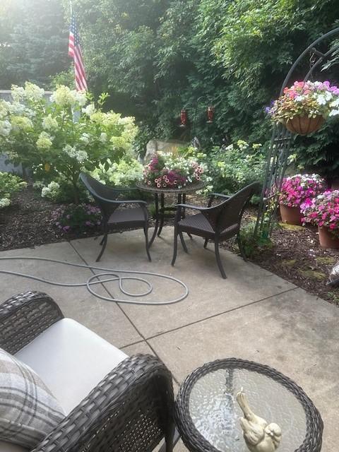 view of patio featuring outdoor dining area