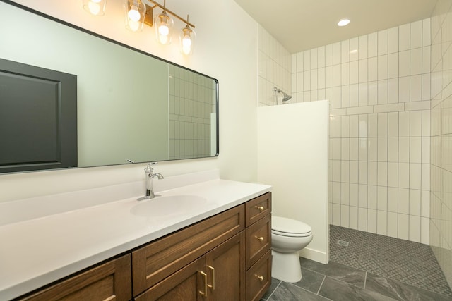 bathroom with toilet, recessed lighting, walk in shower, and vanity