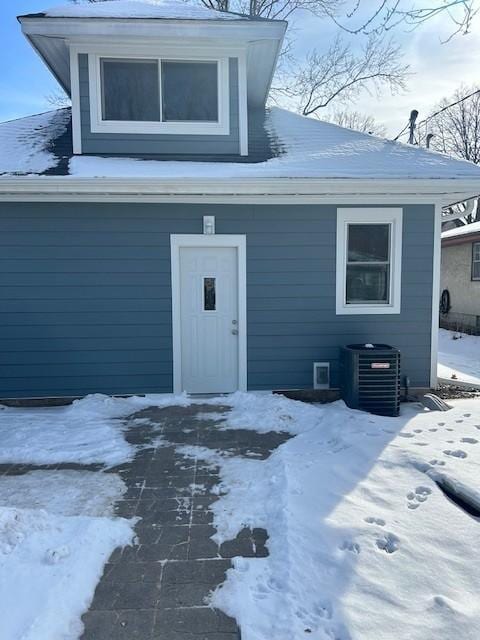 exterior space featuring central AC unit